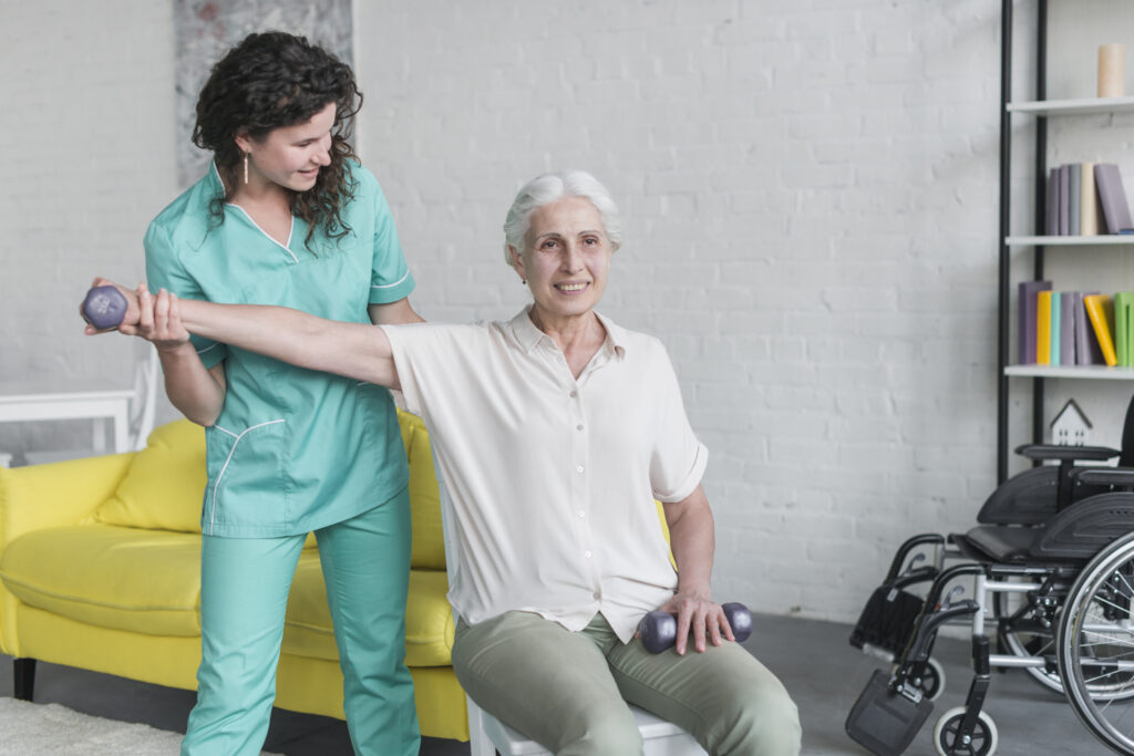 Physiotherapist guiding elderly woman through augmented reality rehabilitation exercises